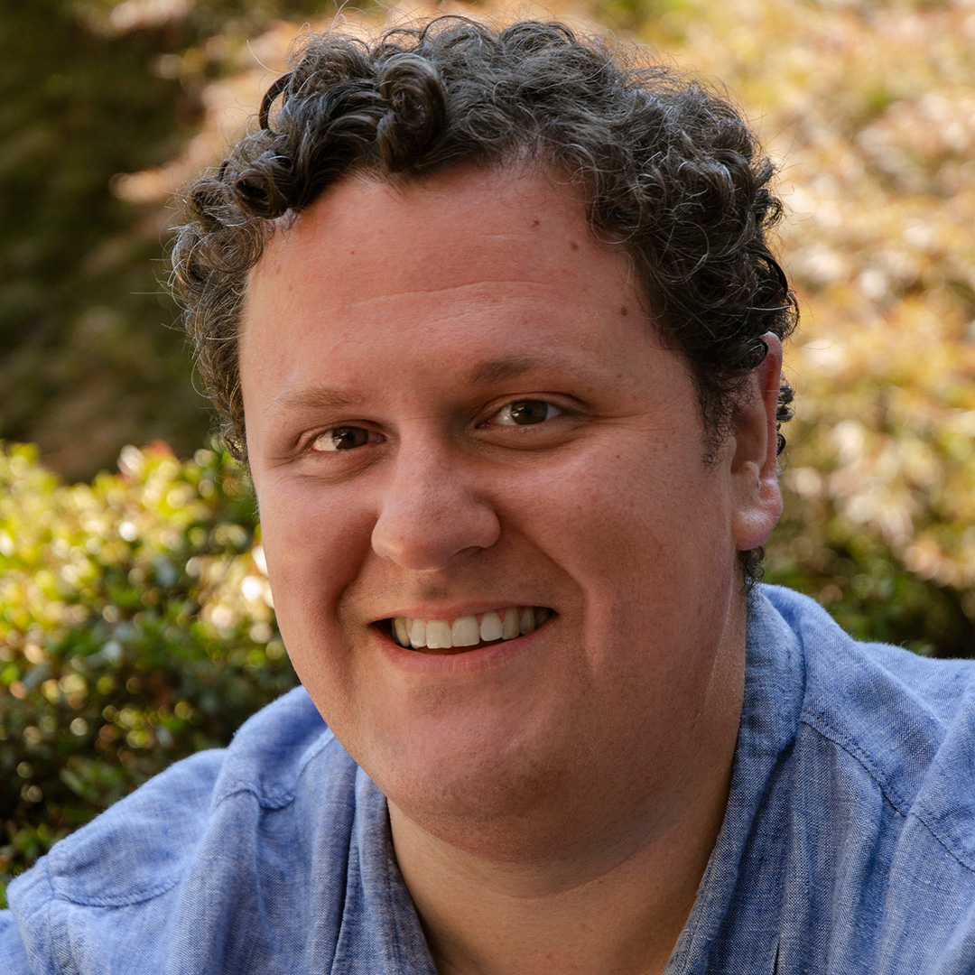 Headshot of Adam Becker